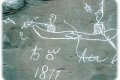 Petroglyph image of porpoise hunt by canoe © Parks Canada